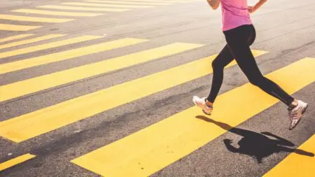 o_blonde-woman-running-over-the-pedestrian-crossing-picjumbo-com_20200410134841